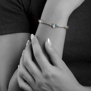 MODEL Five aquamarine silver and gold bezel bracelet