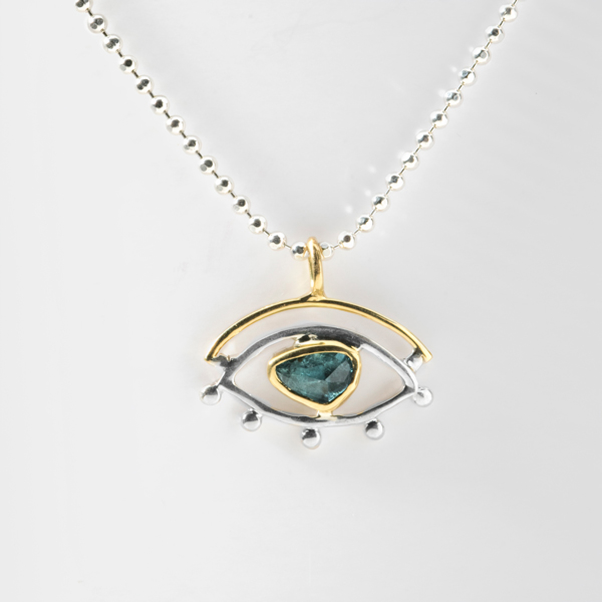 Blue Topaz, Gold & Silver eye pendant