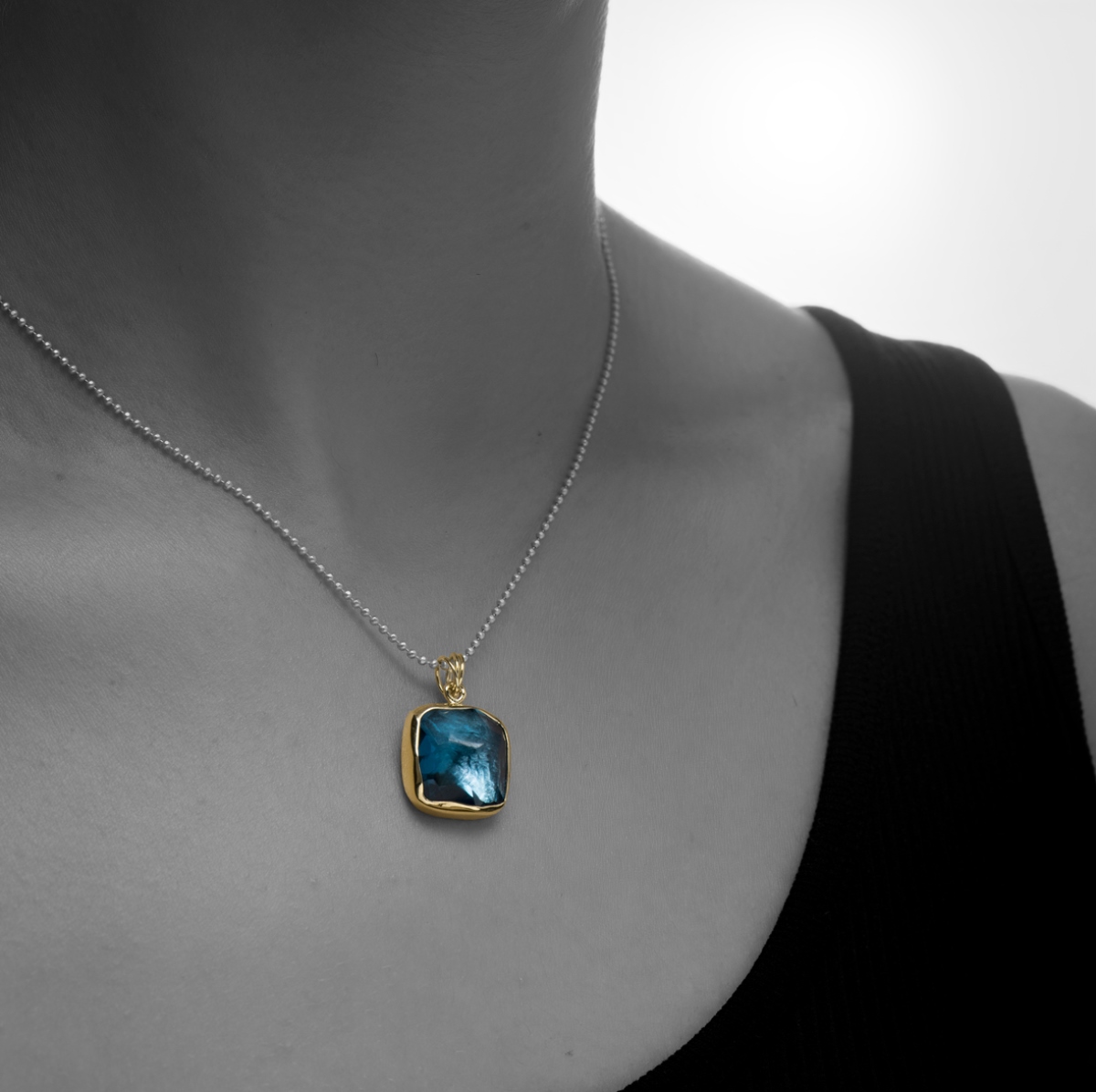 Blue stone gold bezel and silver beaded chain pendant