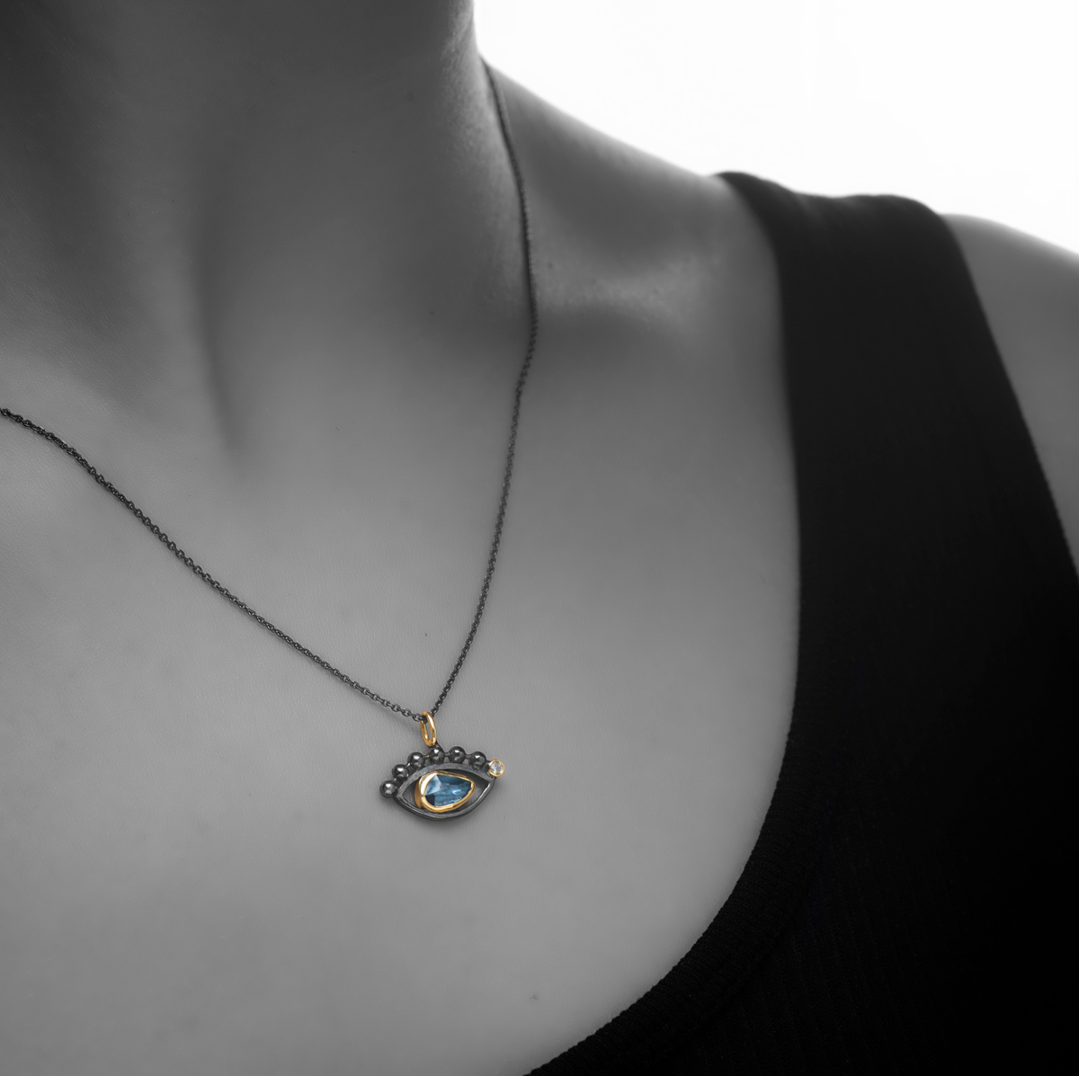 Aquamarine or Blue Topaz, Diamond, Gold & Silver eye pendant